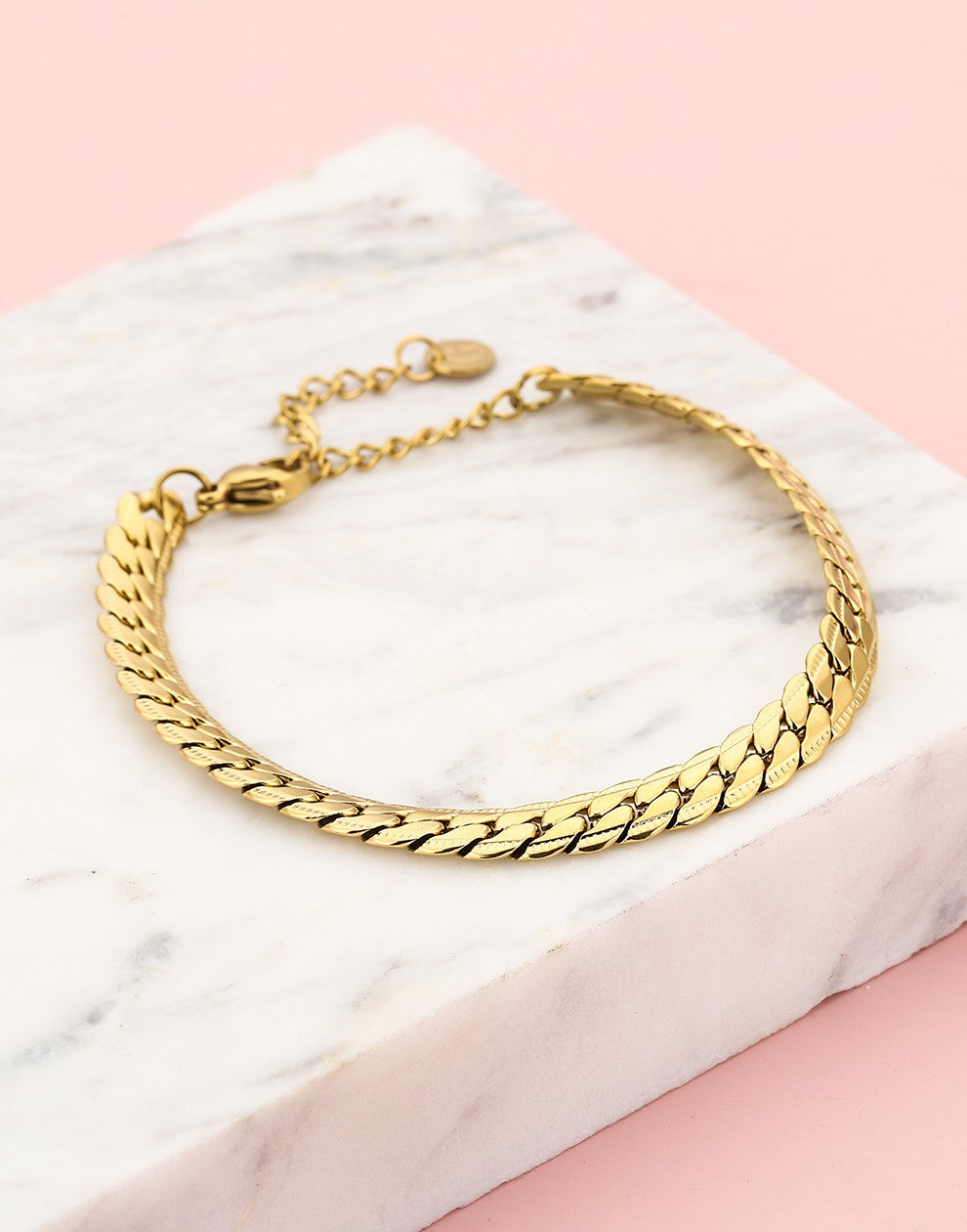Platte schakelarmband goudkleurig