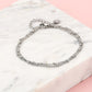 Armband zilverkleurig bolletjes drielaags