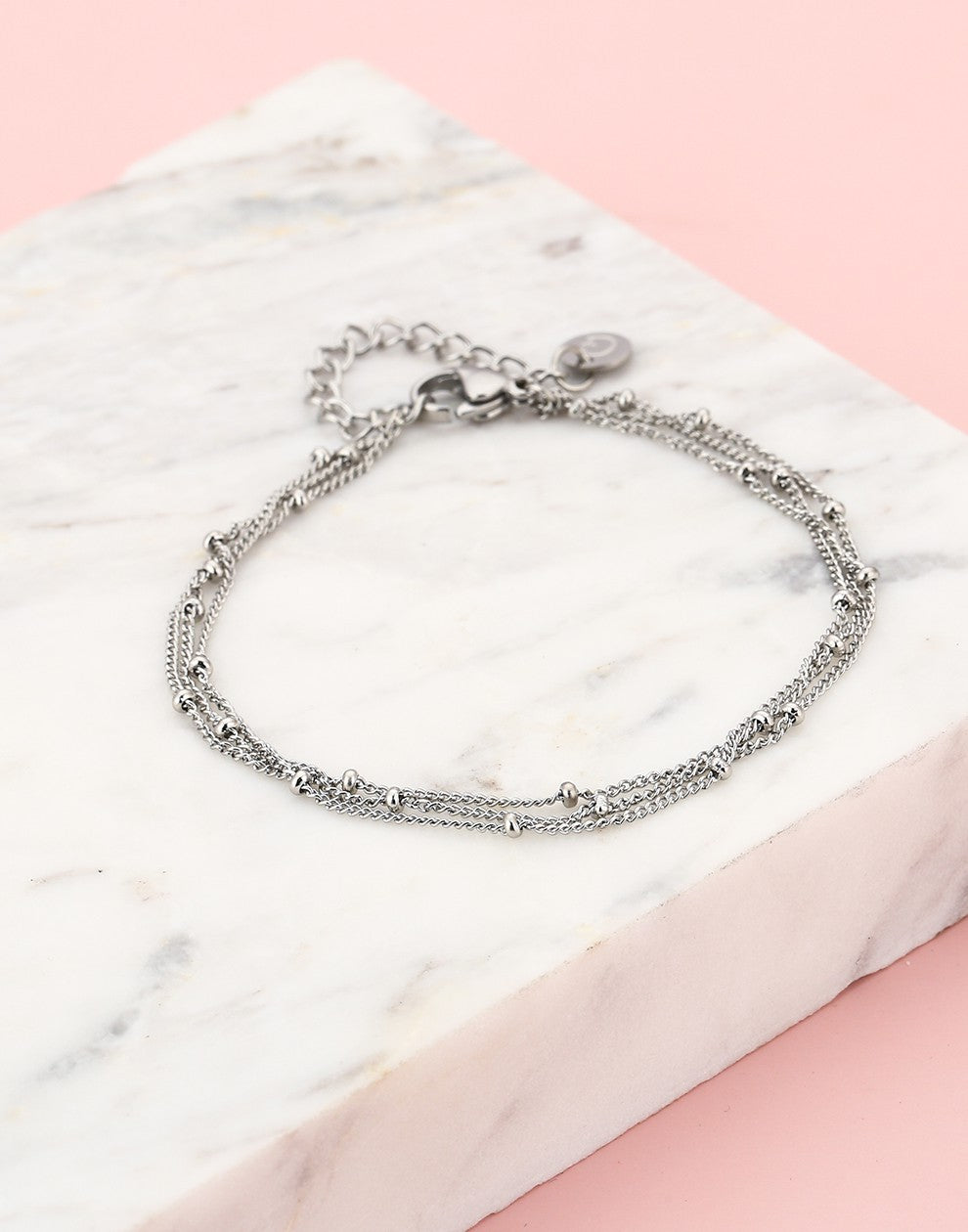 Armband zilverkleurig bolletjes drielaags