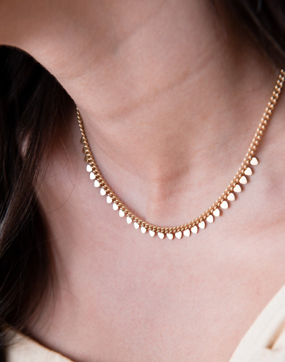 Schakelketting met hartjes goudkleurig