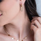 Bolletjes ketting met muntjes goudkleurig