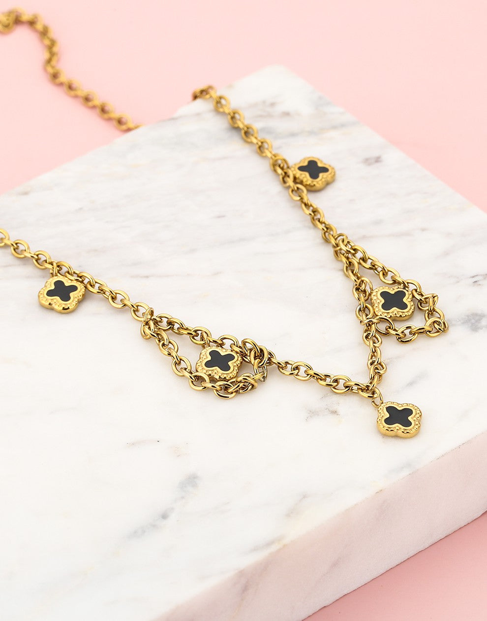 Schakelketting klavers zwart goudkleurig