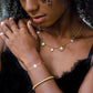 Schakelketting klavers wit goudkleurig