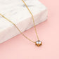 ketting steen rond goudkleurig