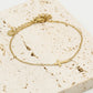 Armband kruisje goudkleurig