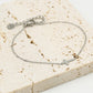 Armband kruisje zilverkleurig