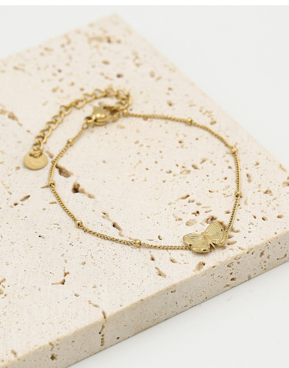 Vlinder armband goudkleurig