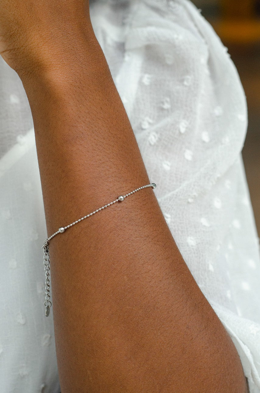 silver-colored bead bracelet