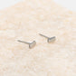 Silver-colored stud bar