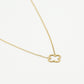 Gold-colored open clover necklace