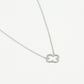 Silver-colored open clover necklace