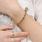 ring schelp patroon goudkleurig
