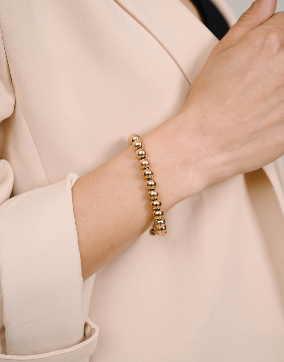 Armband bolletjes 8mm goudkleurig