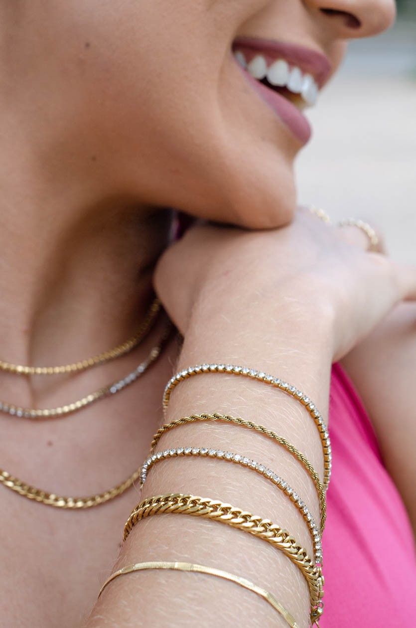 Schakelarmband grof goudkleurig