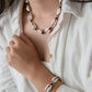 schelpenarmband zwart
