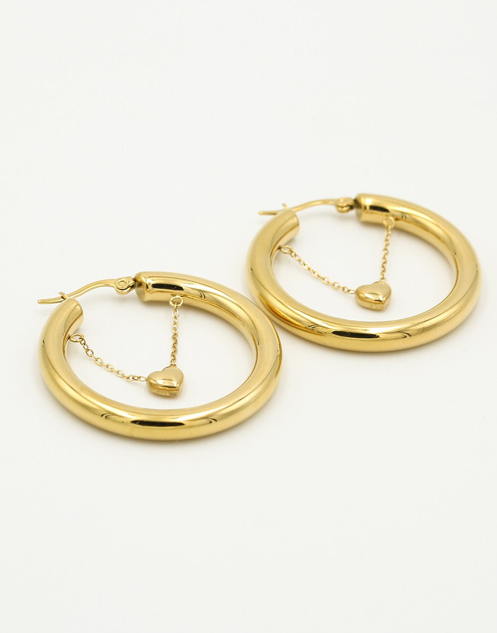 Oorringen hoops hangend hartje goudkleurig
