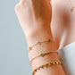 klaverarmband tennis chain goudkleurig