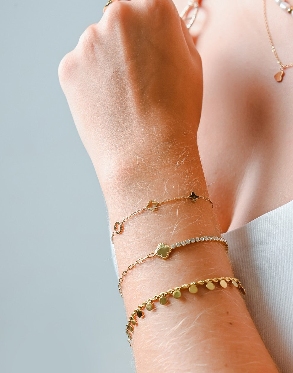 armband symbolen goudkleurig