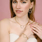 schakelarmband met strass hart goudkleurig