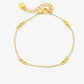 armband triple balls goudkleurig