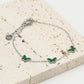 Armband vlinders groen zilverkleurig