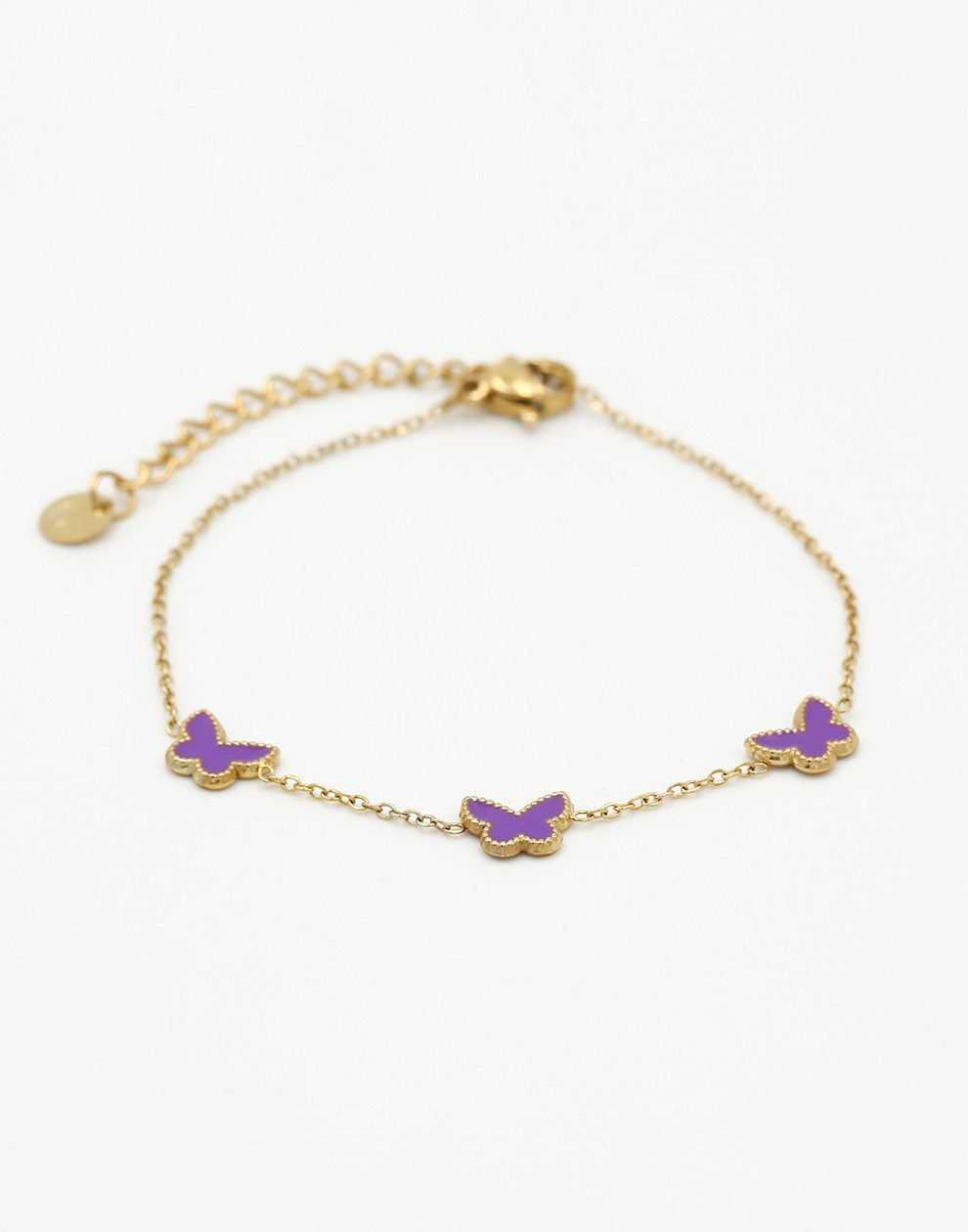 Armband vlinders paars goudkleurig