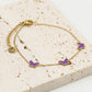 Bracelet butterflies purple gold colored