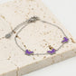 Armband vlinders paars zilverkleurig