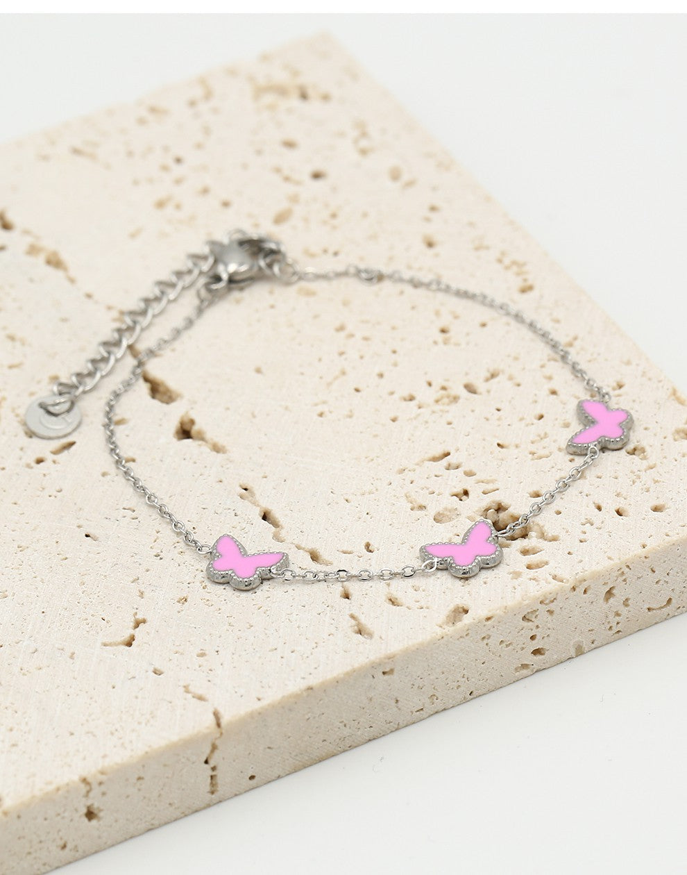 Armband vlinders roze zilverkleurig