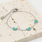 Armband vlinders turquoise zilverkleurig