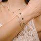 Armband vlinders groen goudkleurig