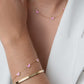 Armband vlinders roze goudkleurig