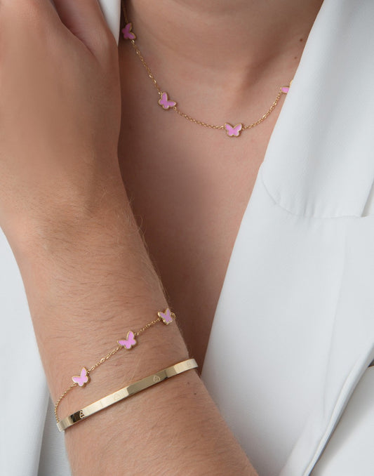 Armband vlinders roze goudkleurig