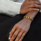 Schakelarmband vintage hartjes goudkleurig