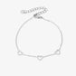Armband 3 open hartjes zilverkleurig