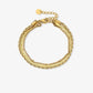 schakelarmband triple goudkleurig