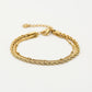 schakelarmband triple goudkleurig