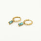 goudkleurigen oorringen met hanger turquoise steen