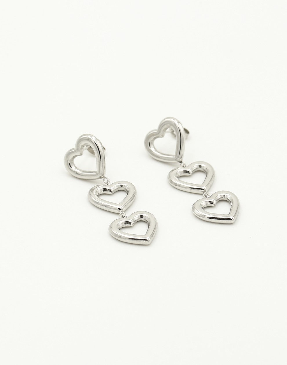 triple open hartjes hanger zilverkleurig