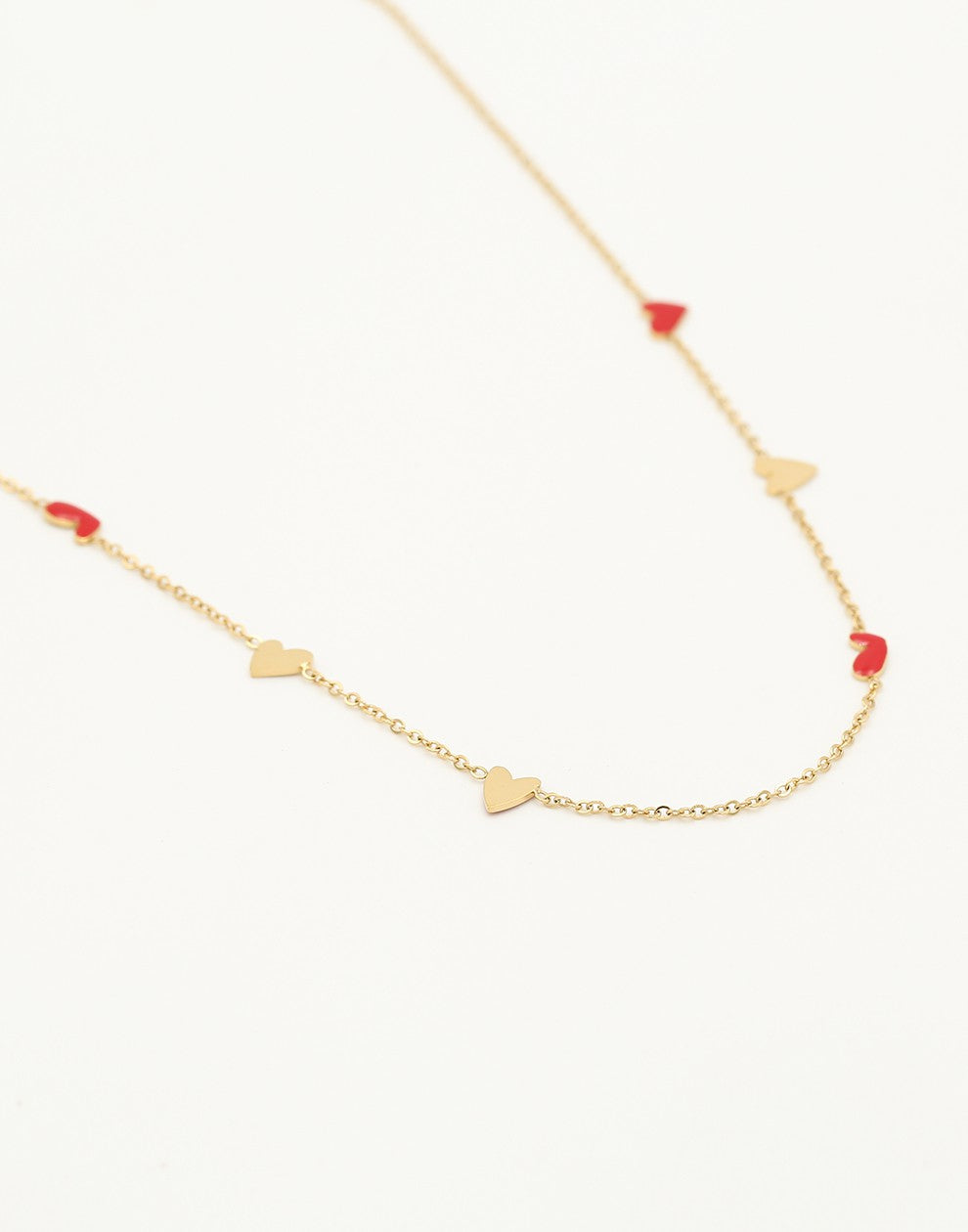 Ketting rode hartjes goudkleurig
