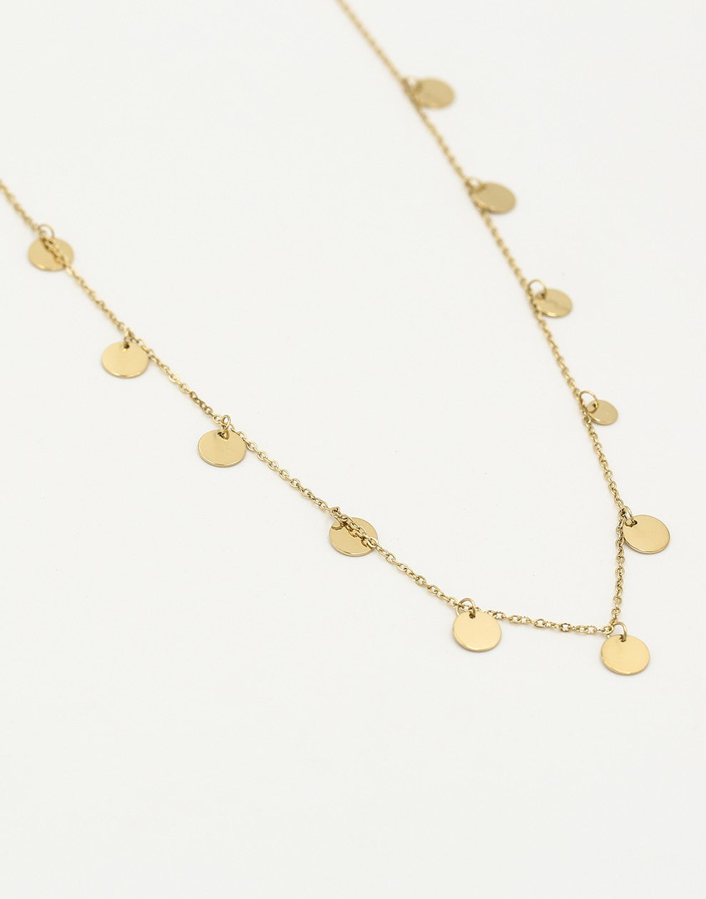Fijne ketting met muntjes 7mm in goudkleurig