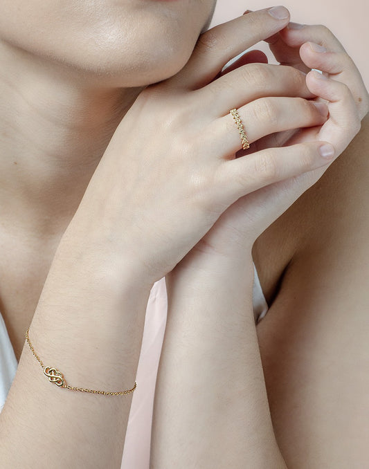 Armband love infinity goudkleurig
