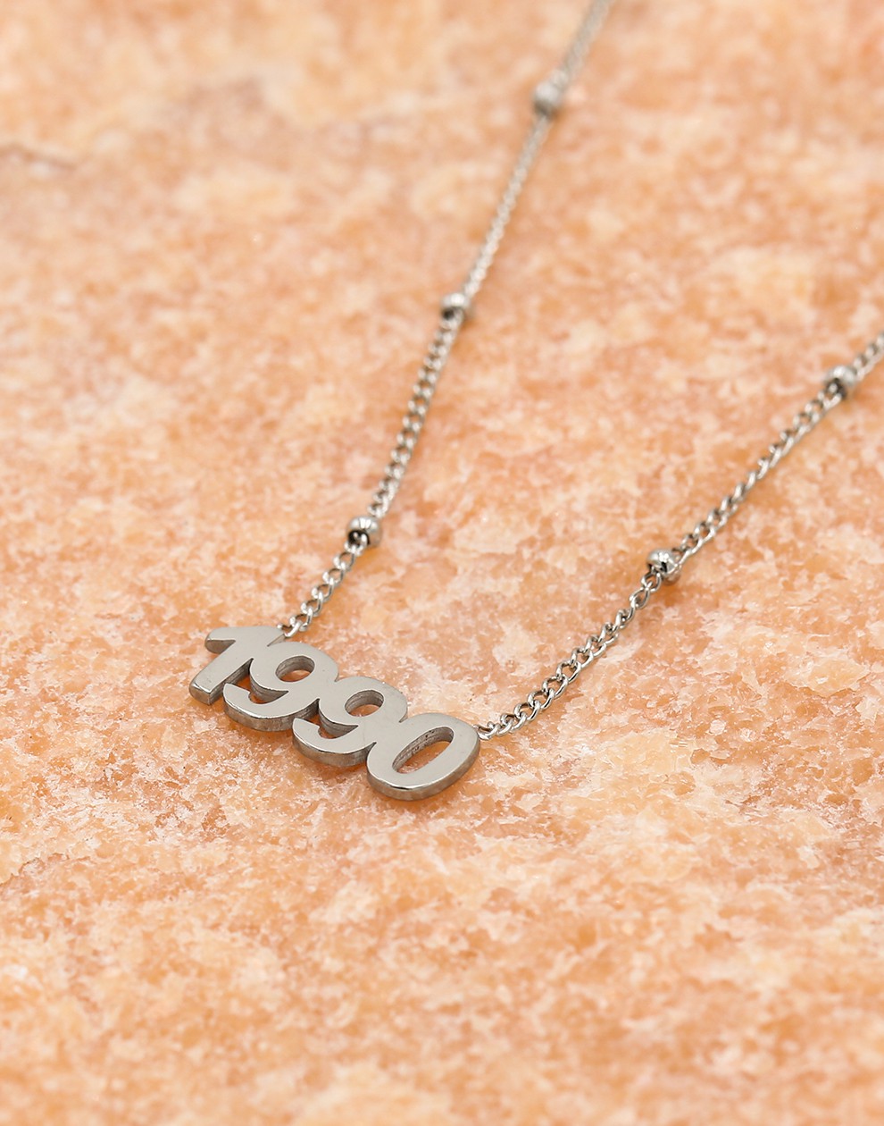 Ketting jaartal 1990 zilverkleurig