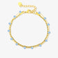 Dubbele armband lila kraal goudkleurig