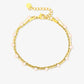 Dubbele armband roze kraal goudkleurig