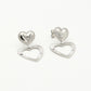 earrings with 2 silver-colored hearts