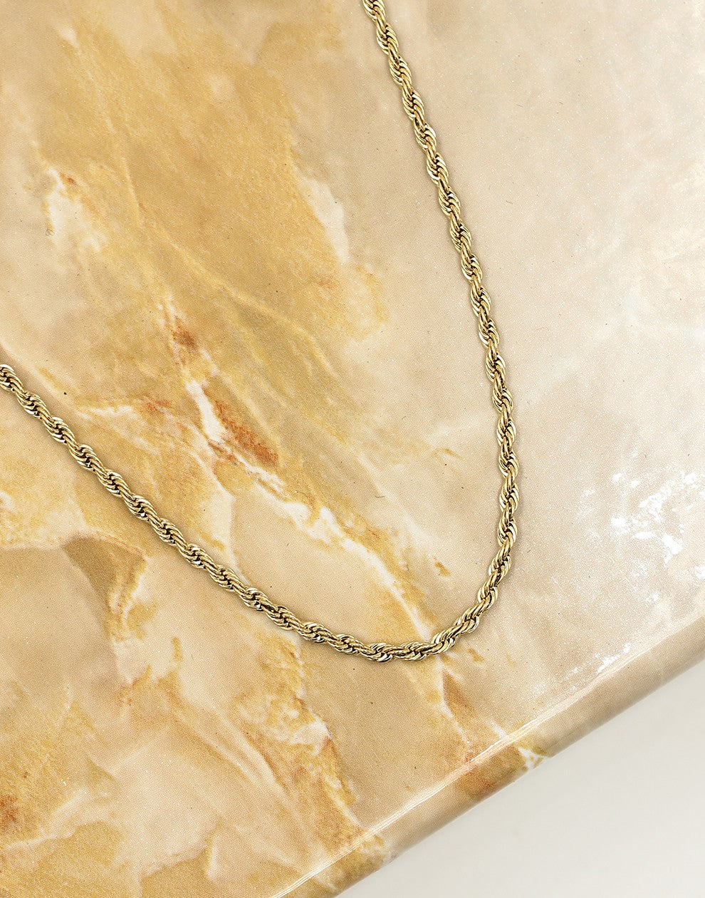 Gedraaide schakelketting 55cm in goudkleurig