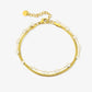 Dubbele armband goudkleurig wit