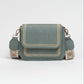 Crossbody tas met bewerkte strap groen
