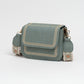 Crossbody tas met bewerkte strap groen